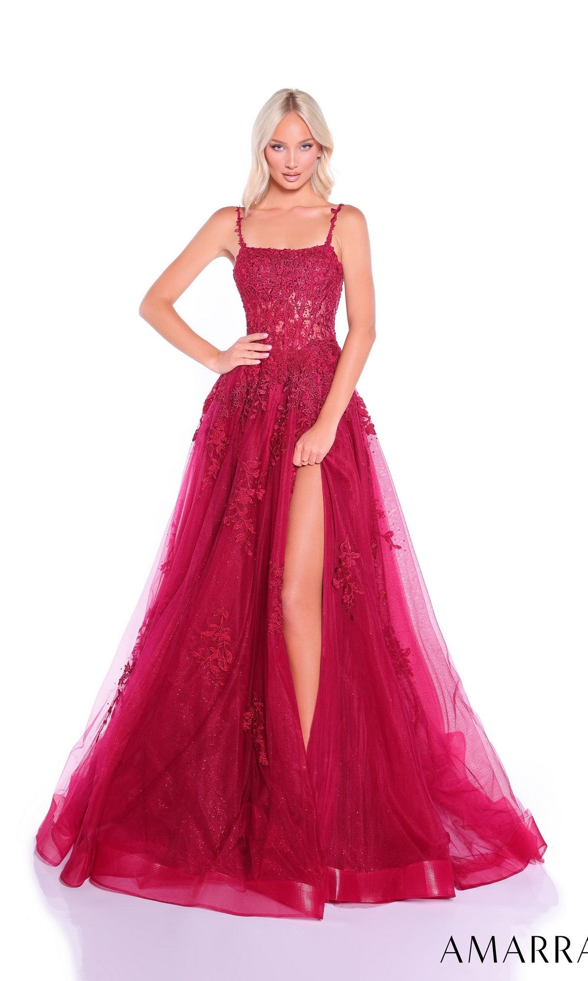 Model showcases the Amarra 89525 Embroidered-Bodice Long Prom Dress: a sleeveless, floor-length dark red gown with floral embellishments, sheer overlay, and high slit, posed against a plain white background.